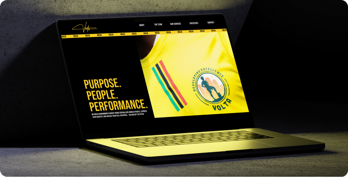 Volta Management website homepage shown on a laptop